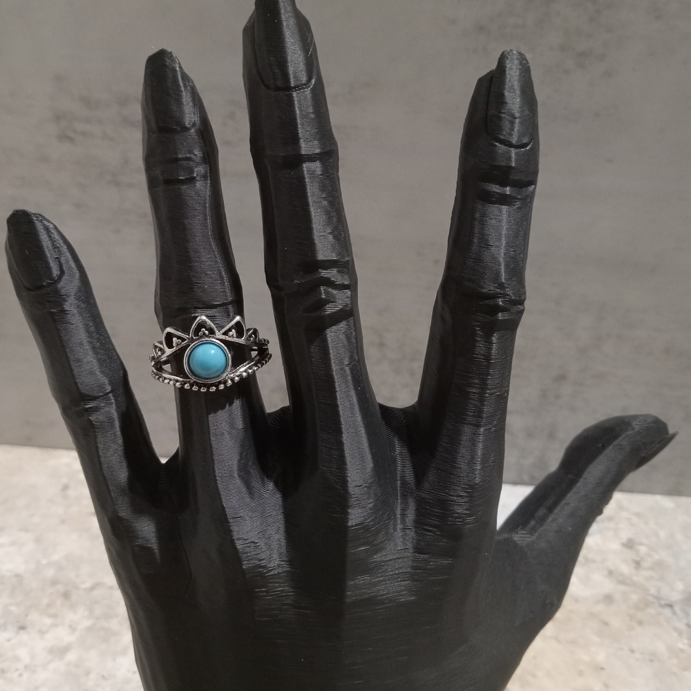 Silver Tone Ring with Turquoise Colored Accent